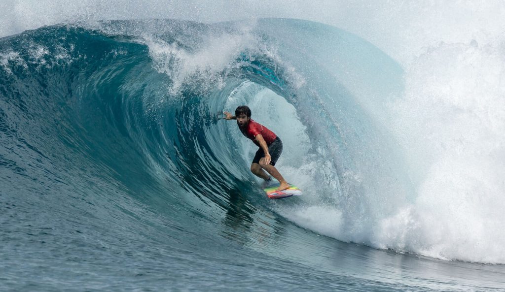Mason Ho surfing the Maldives.
