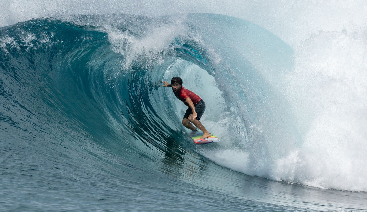 Mason Ho surfing the Maldives.