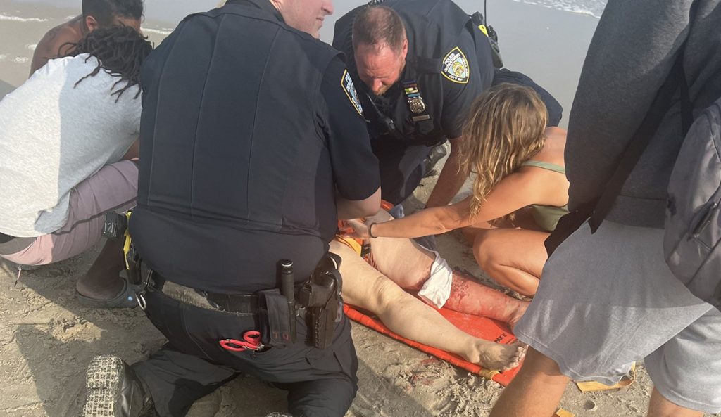 Woman bitten by shark at Rockaway Beach.