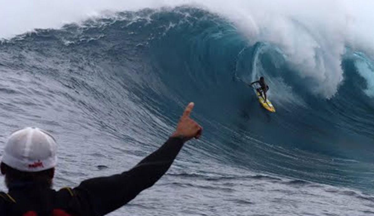 Kai Lenny stand up paddle boarding at Jaws