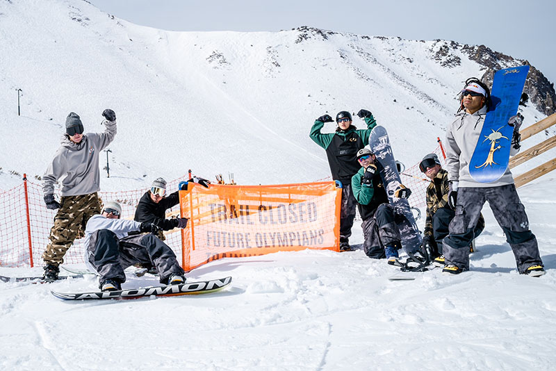 a group shot of the Thirtytwo snowboard team on a mountain