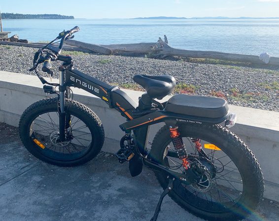 engwe x24 ebike next to a beach
