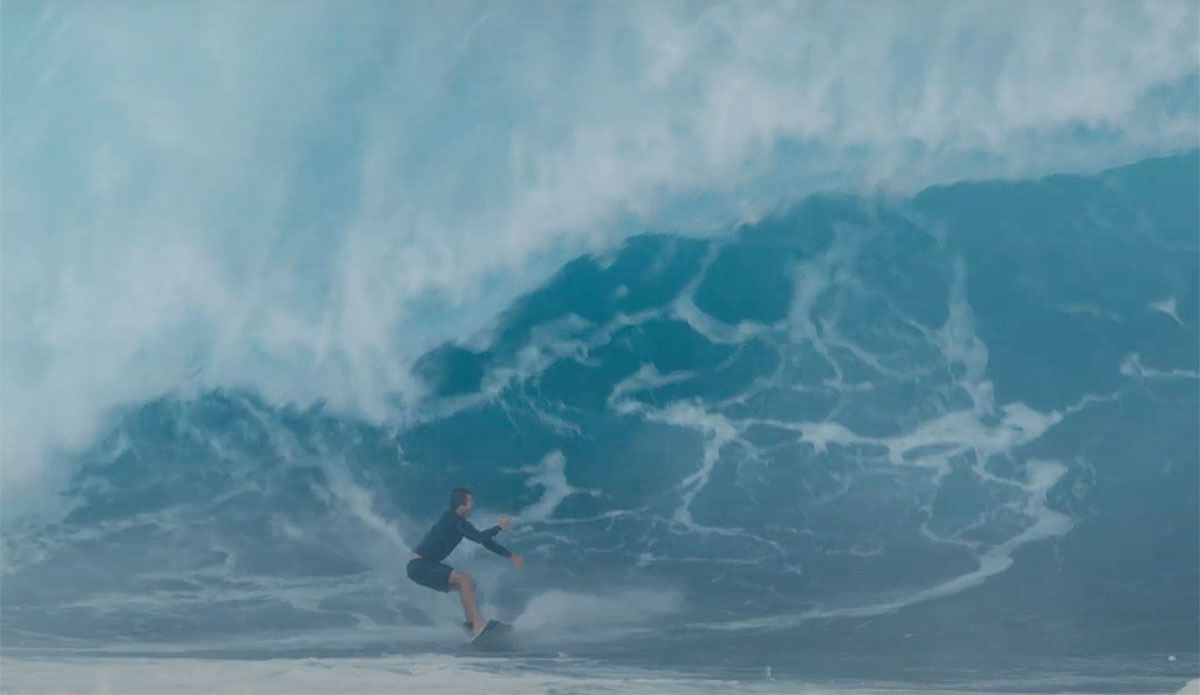 surfers wiping out at Pipeline