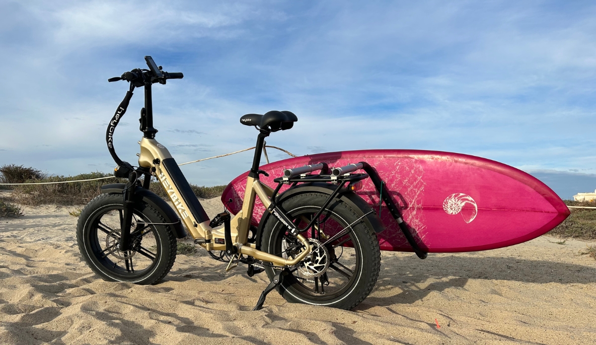Heybike Ranger S Fat Tire Electric Bike with a surfboard rack makes the commute to surf a cinch. Photo: The Inertia