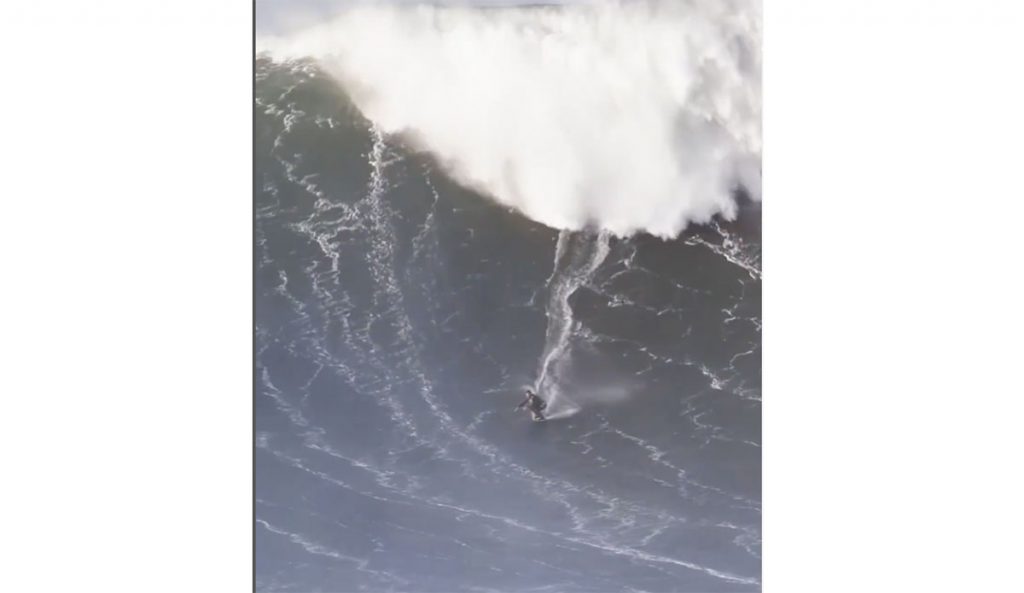 Lucas Fink on skimboard at Nazare