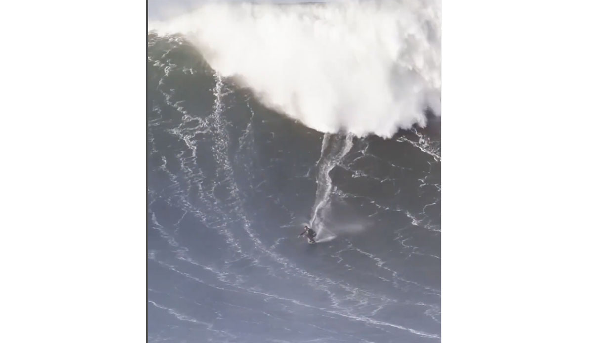 Lucas Fink on skimboard at Nazare