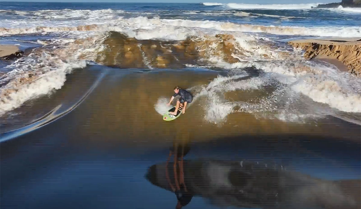 Jamie O'Brien surfing Waimea River