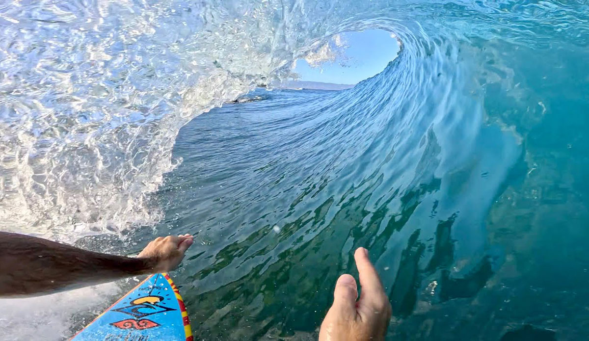 Mason Ho surfing on rocks