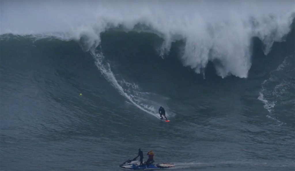 Halloween surfing at Nazaré