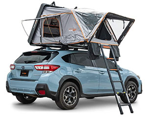 a studio photo of the roofnest condor 2 tent on a subaru crosstrek in a studio promo shot.
