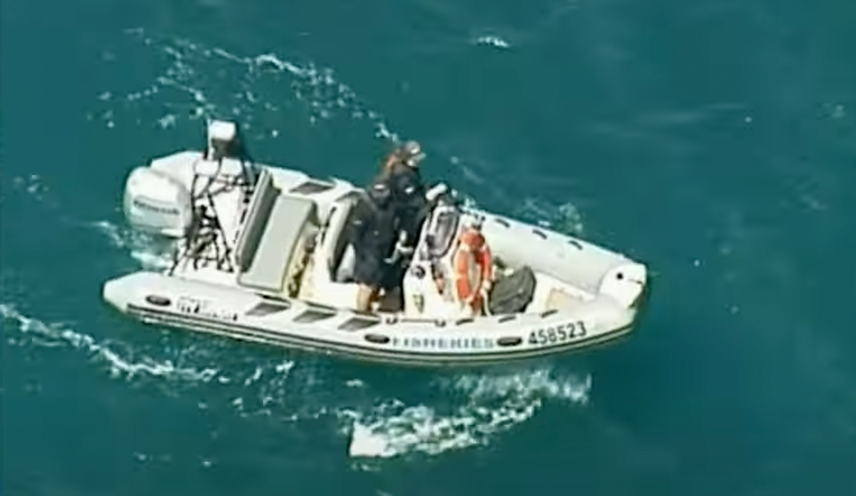 Police search for the remains of a man killed by a shark in Streaky bay. Photo: 9 News // YouTube