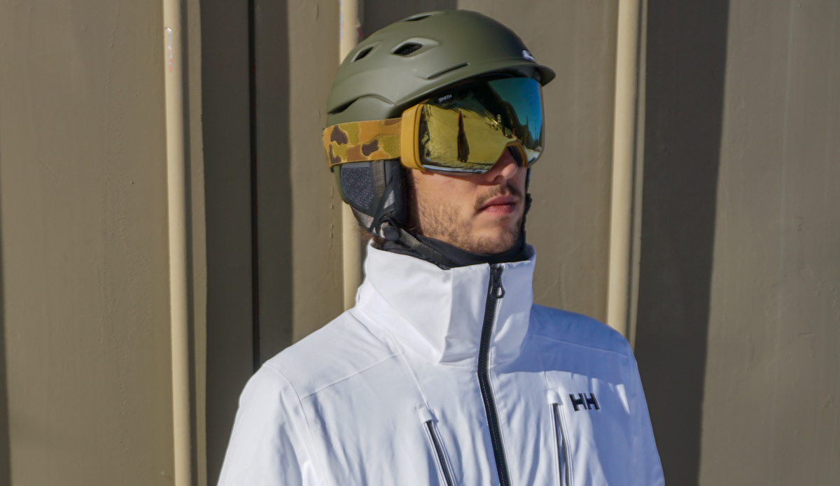 Man wearing Smith Vantage Ski Helmet and Smith 4D Mag Goggles