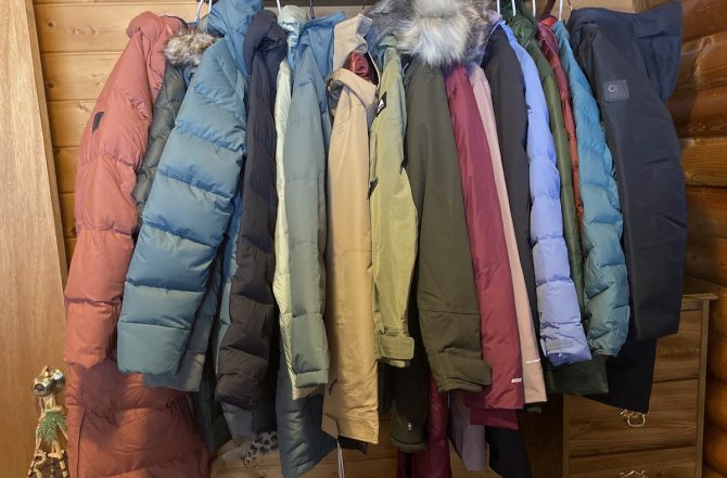 Women's Winter Jackets hanging in a closet