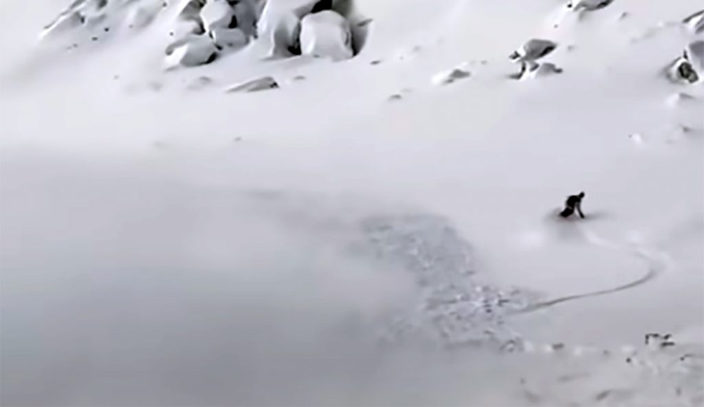 Watch, and Analyze, as This Snowboarder Nearly Gets Taken Out by a Hefty Avalanche