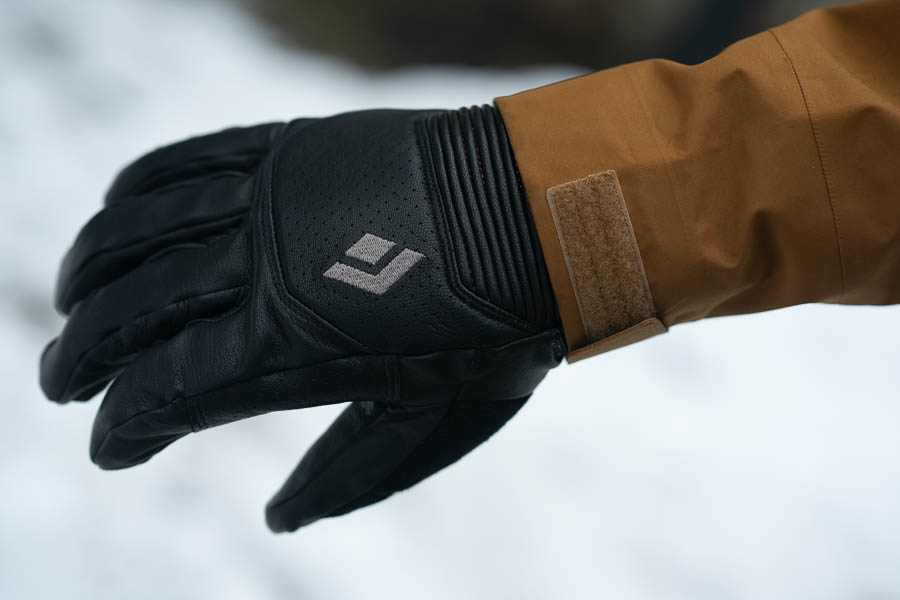 a person wearing the Black Diamond Impulse snowboarding gloves