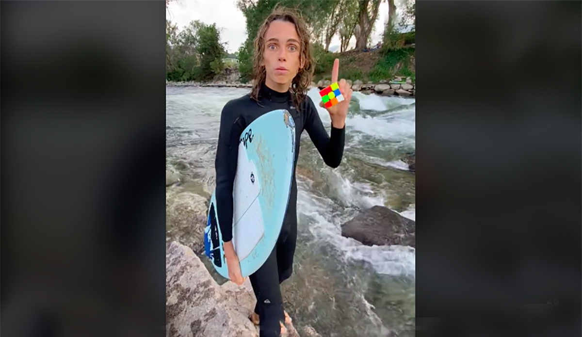Watch This Skimboarder Solve a Rubik’s Cube in Under 2 Minutes While Riding a River Wave