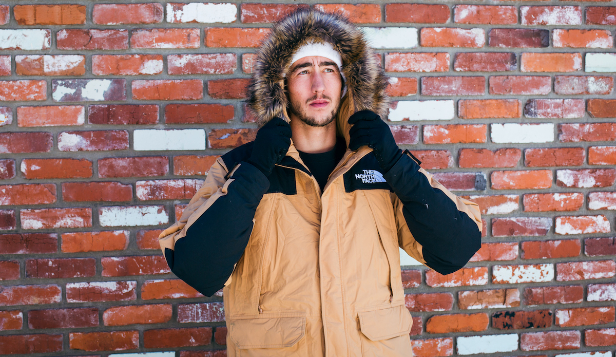 Putting up the hood on the The North Face McMurdo Down Parka