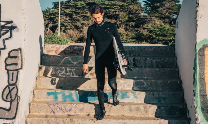 Feral Wetsuit on stairs at Ocean Beach