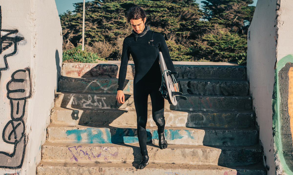 Feral Wetsuit on stairs at Ocean Beach