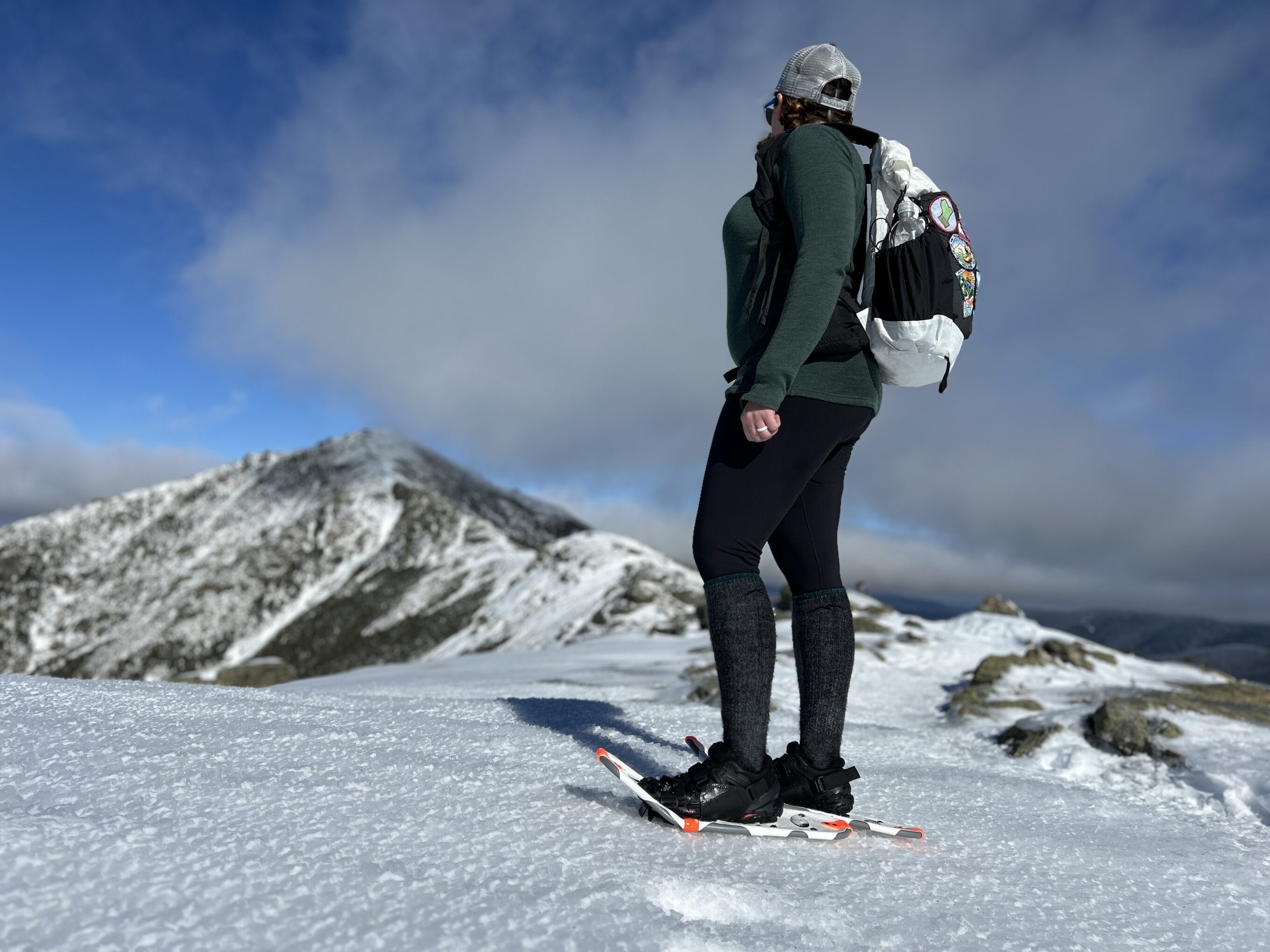 a women testing snowshoes in New Hampshire