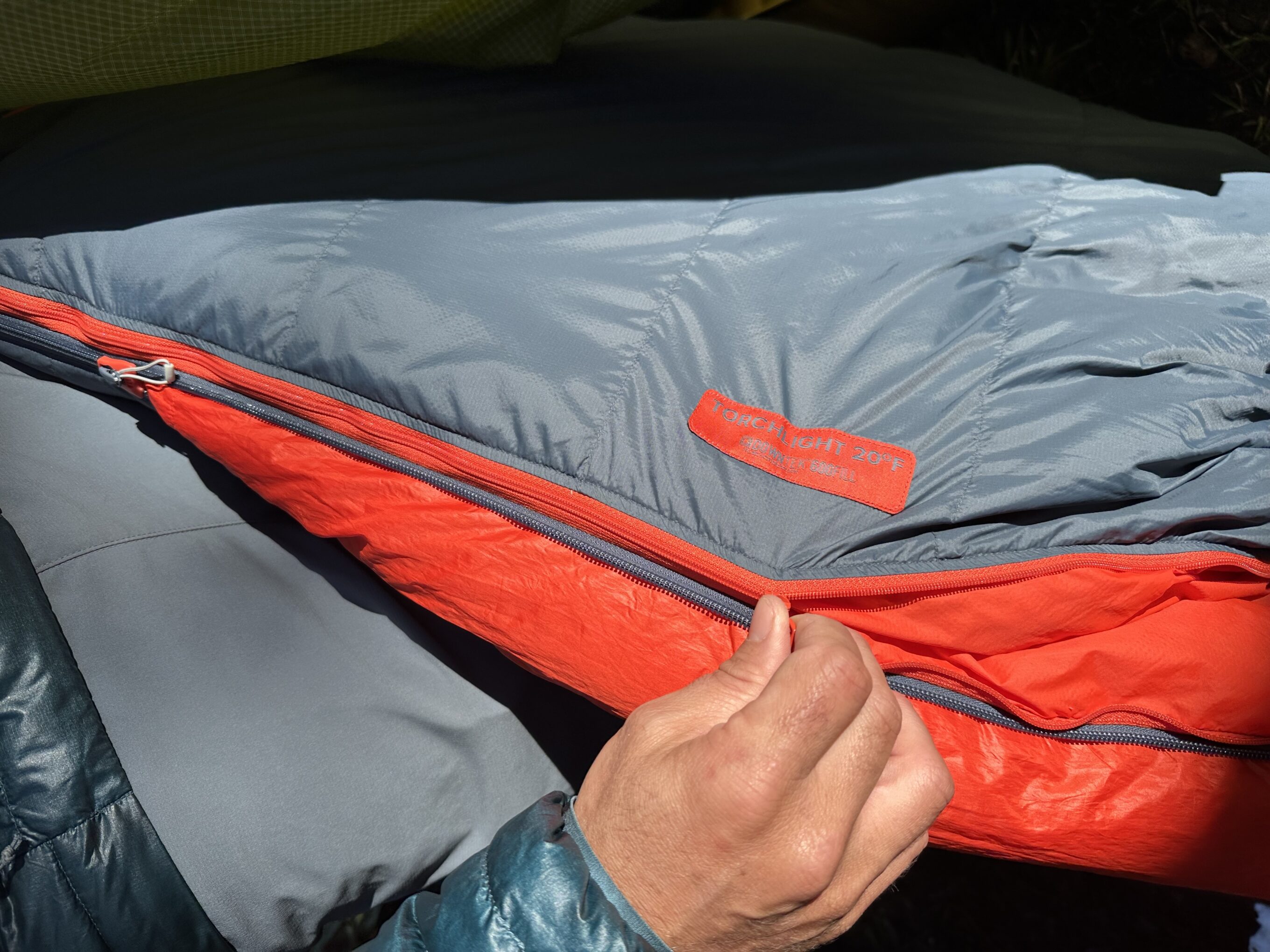 a close up of a zipper on backpacking sleeping bags