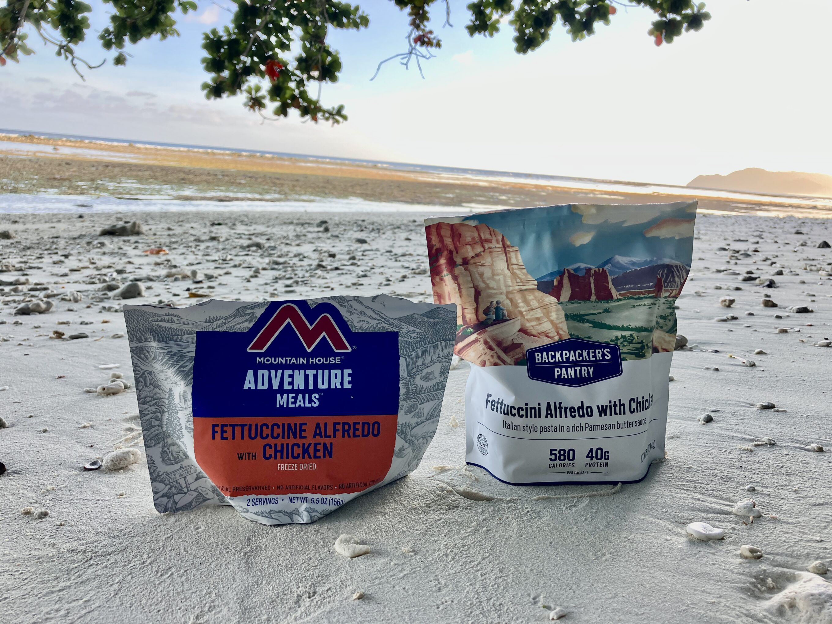 two fettucine alfredo backpacking meals on the beach