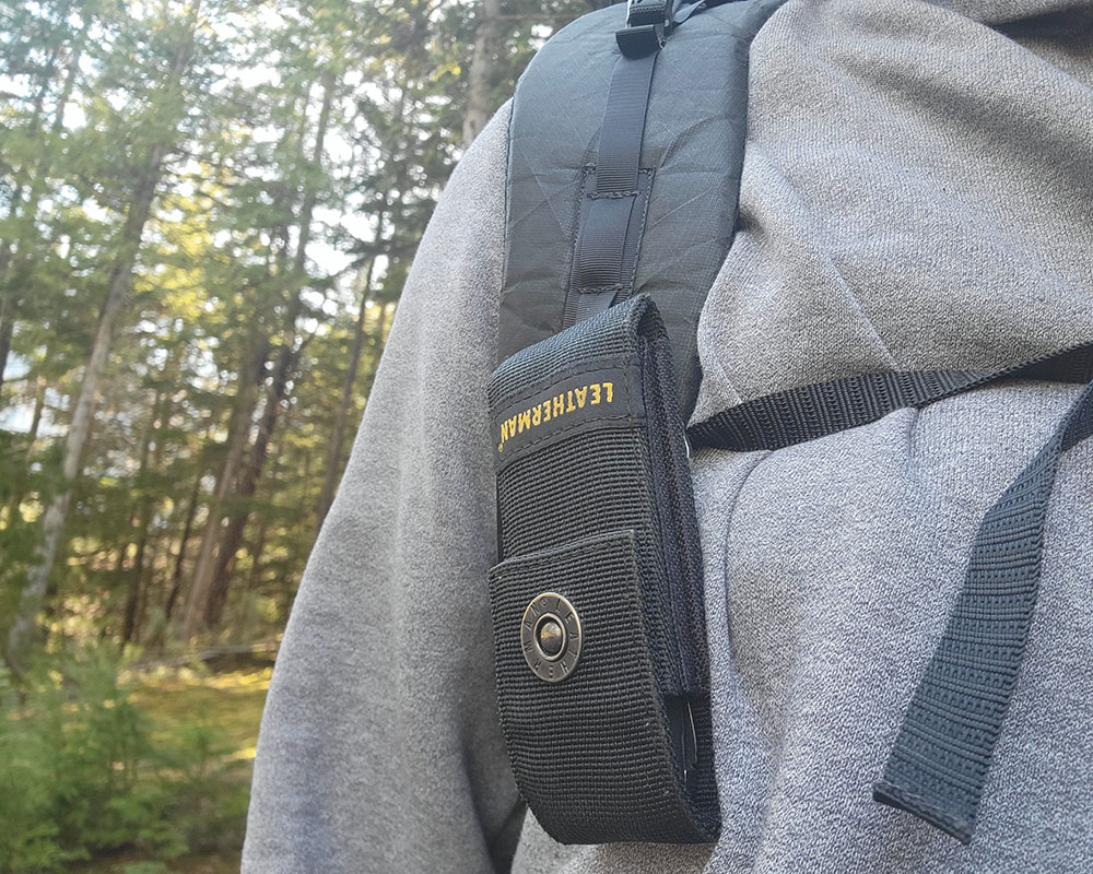 a leatherman multitool on the gear loop of the zpacks arc haul ultra backpack