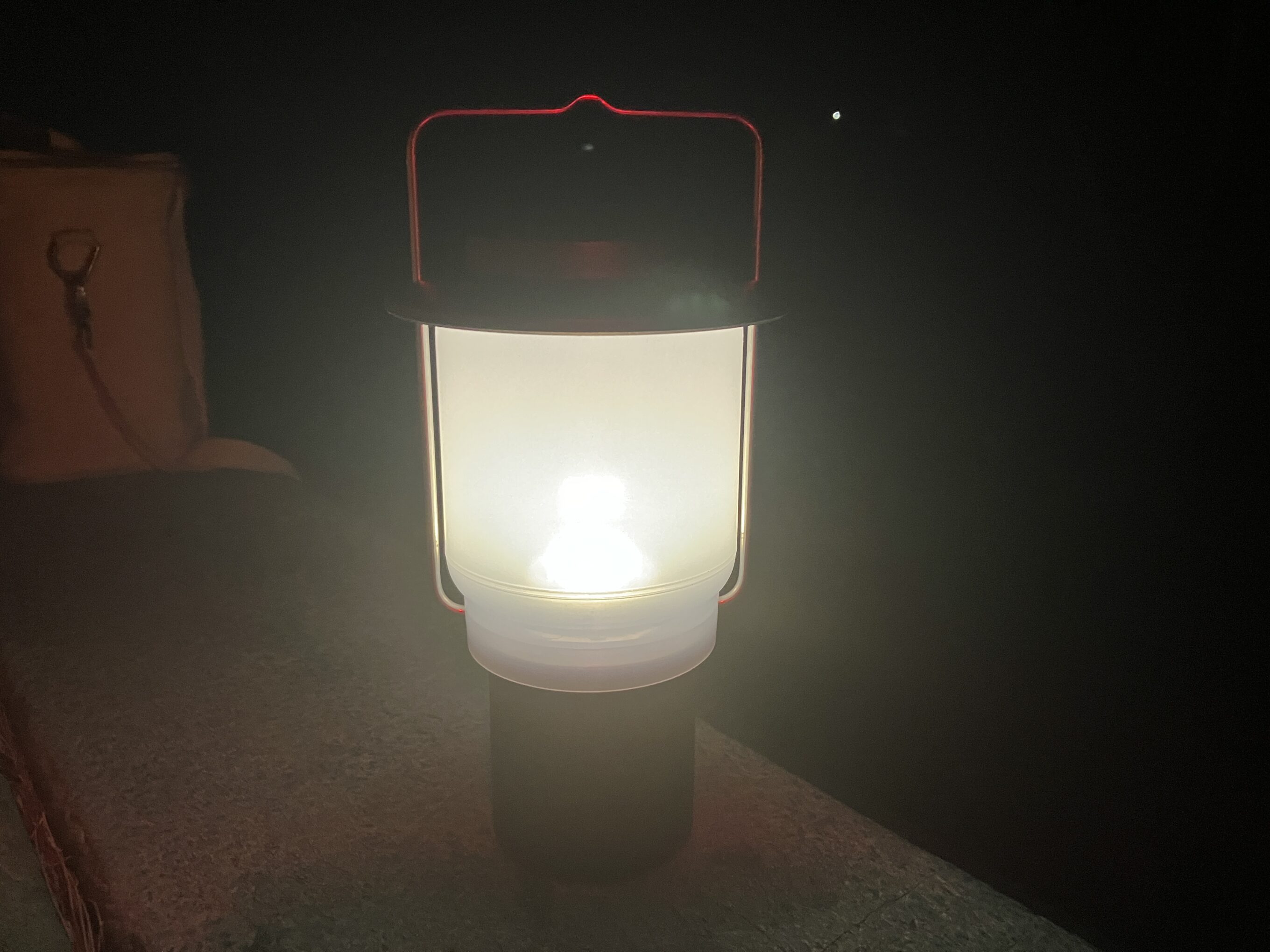 a camping lantern at night