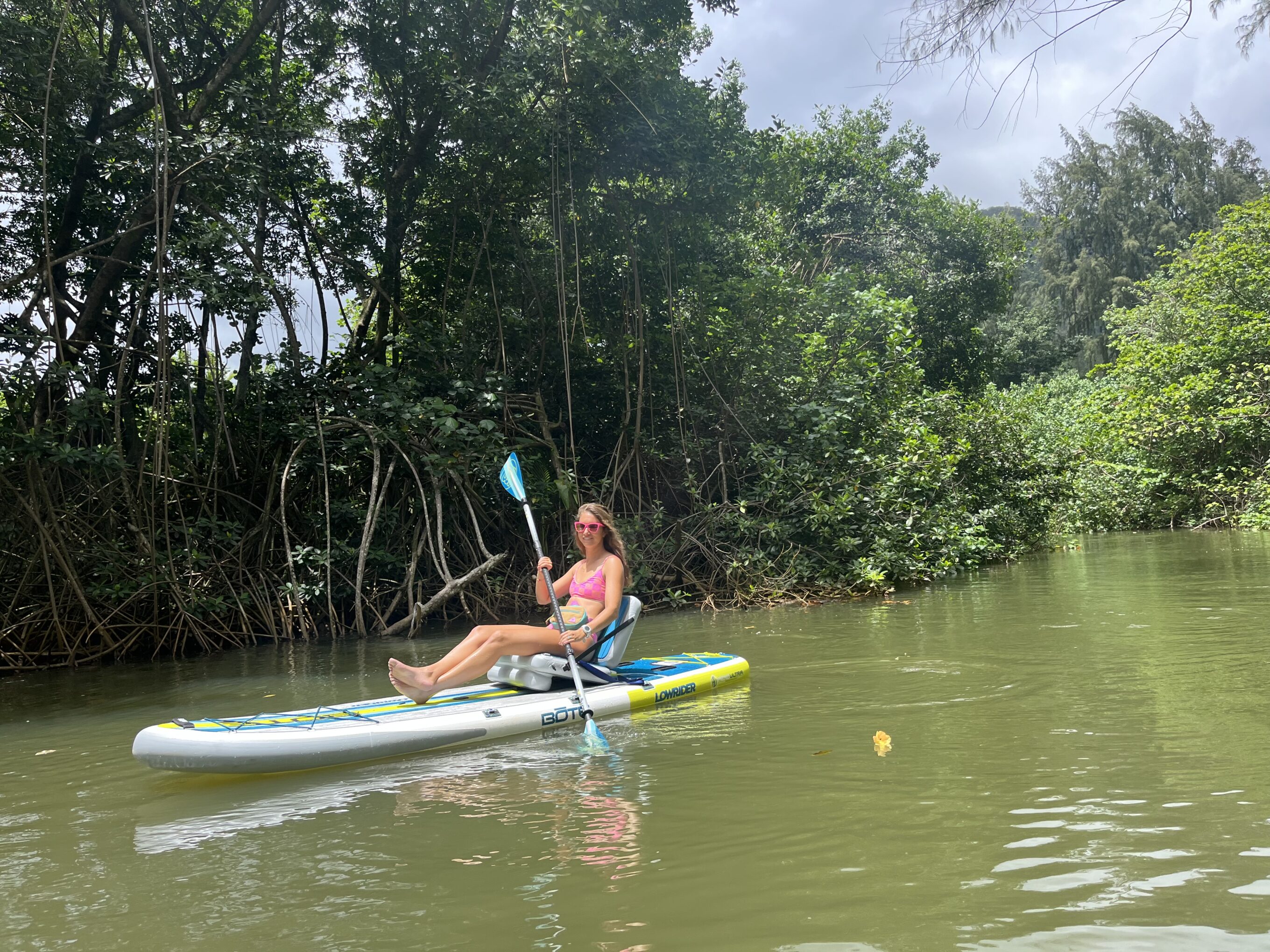 a woman kayaking on the BOTE LowRider