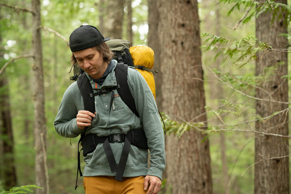Steve andrews, gear tester, testing backpacks in the forest