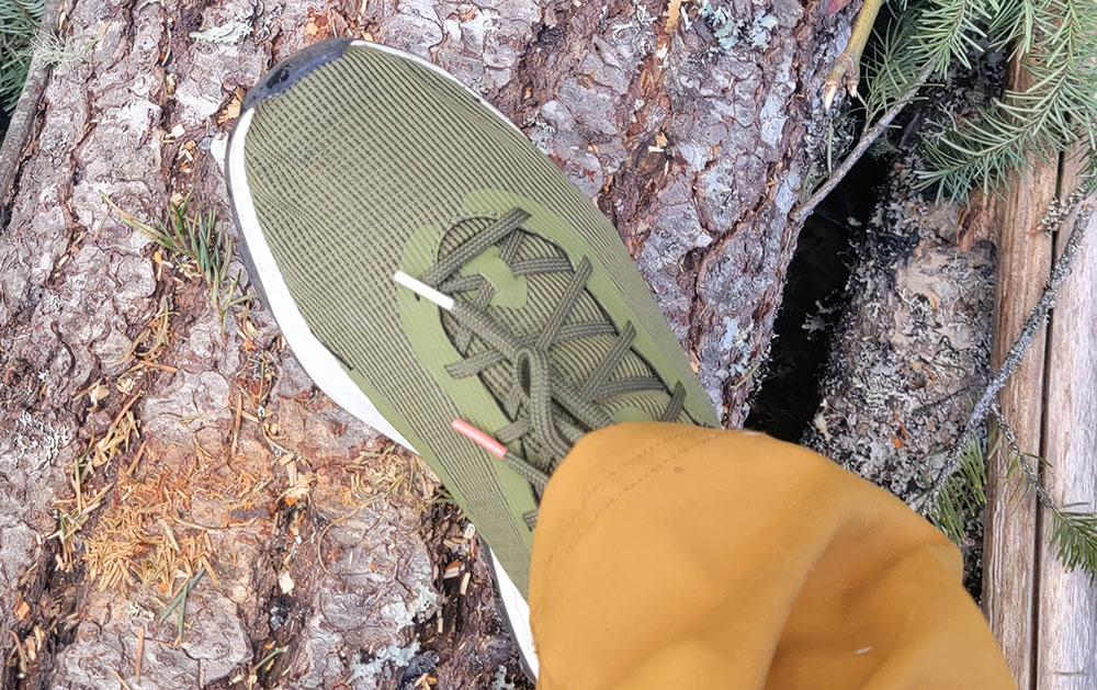 the vasque re:connect here hiking shoes on a log