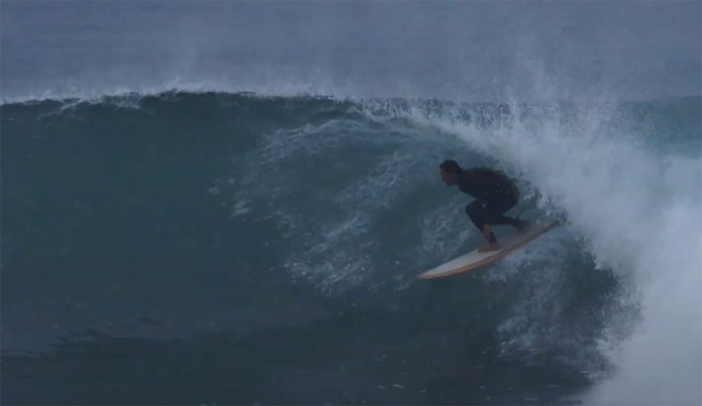 Derrick Disney surfing