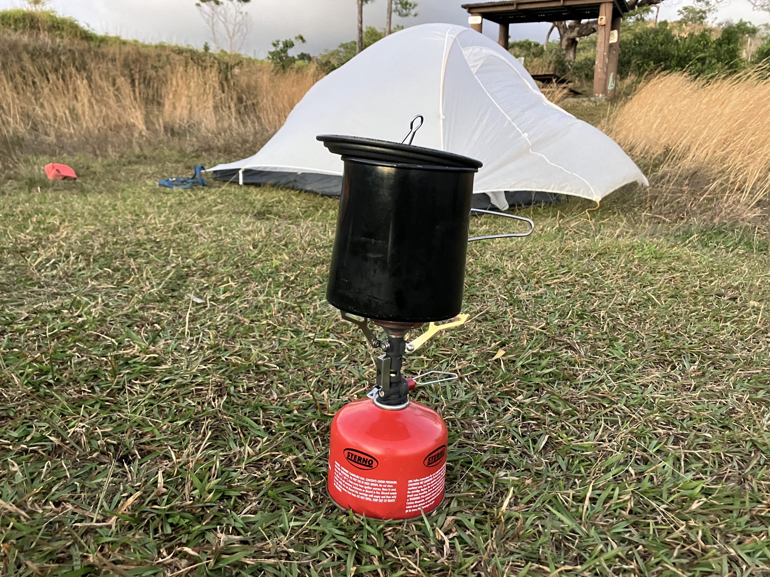 MSR PocketRocket backpacking stove in front of a tent