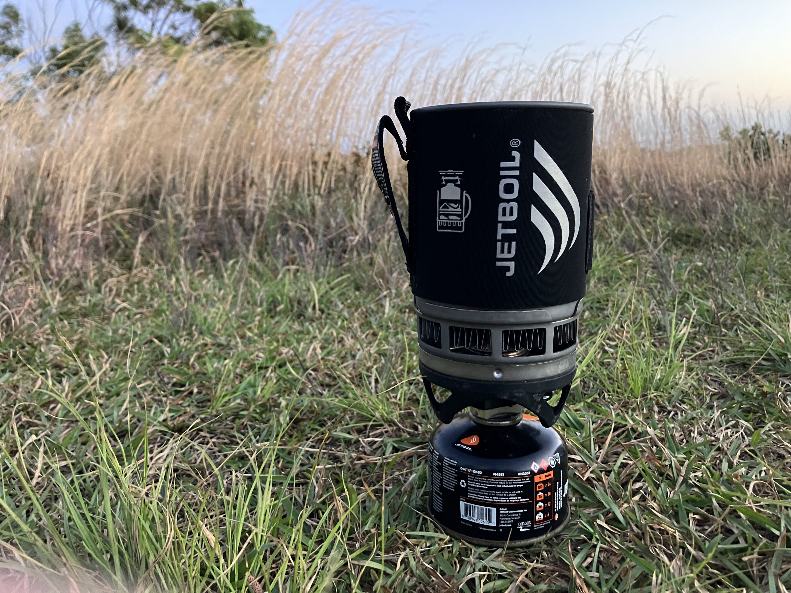 a jetboil sitting on grass