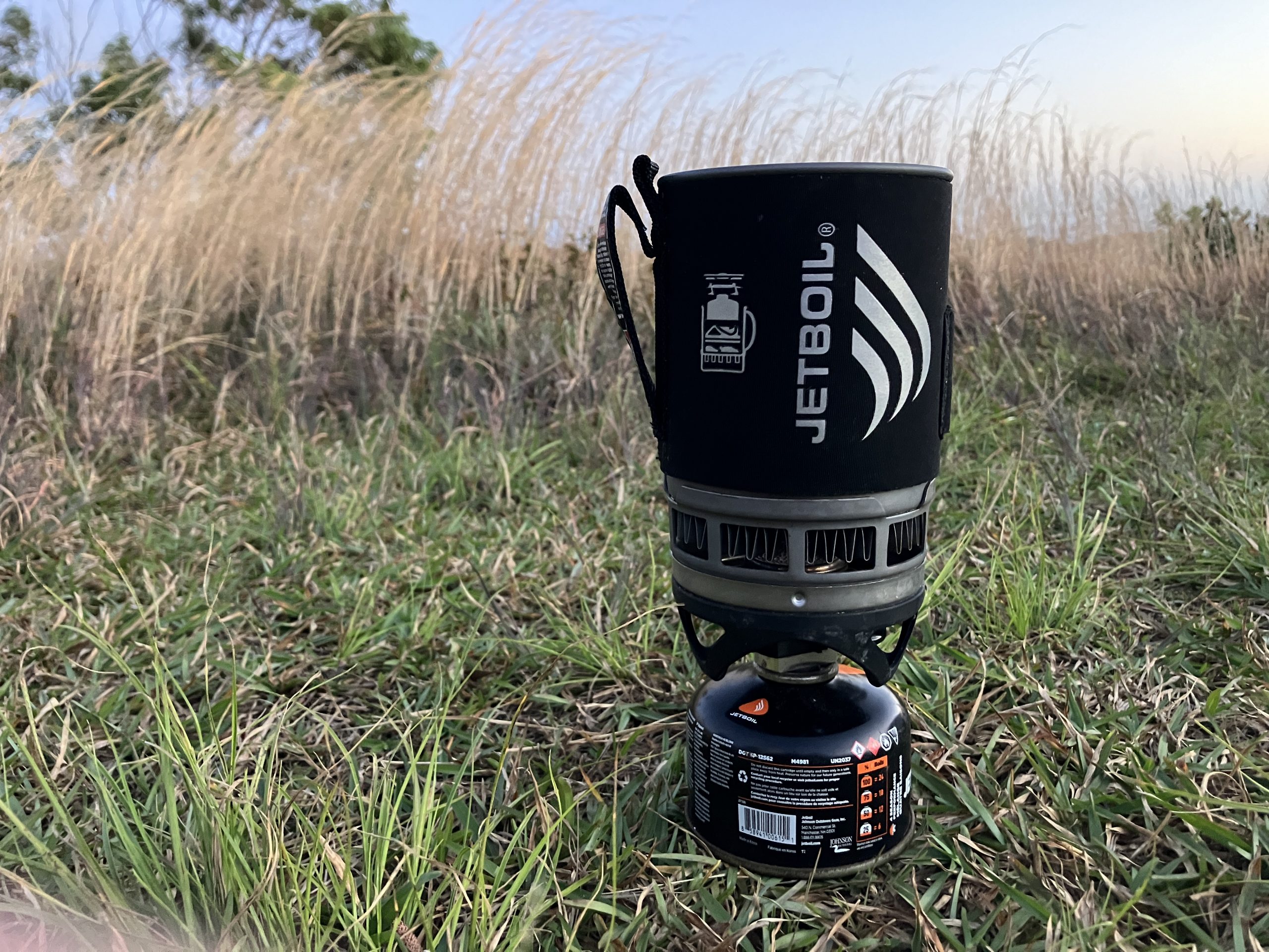 a jetboil sitting on grass