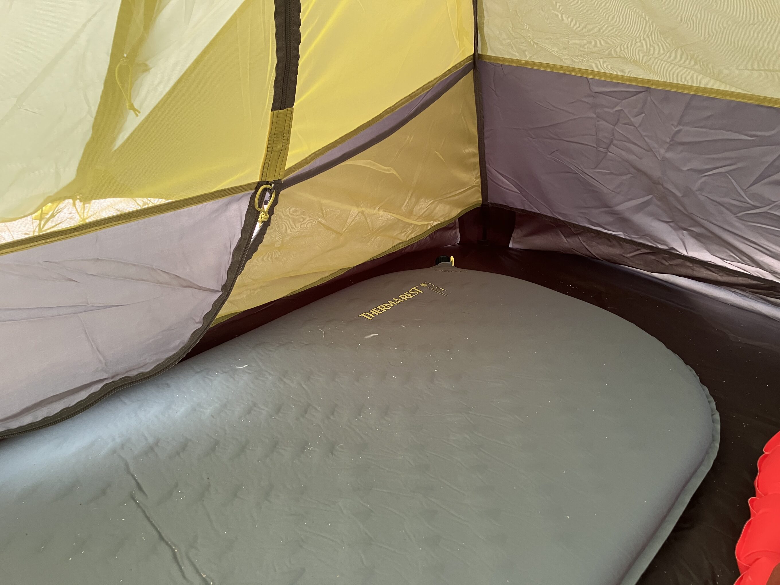 a therm-a-rest sleeping pad inside a tent