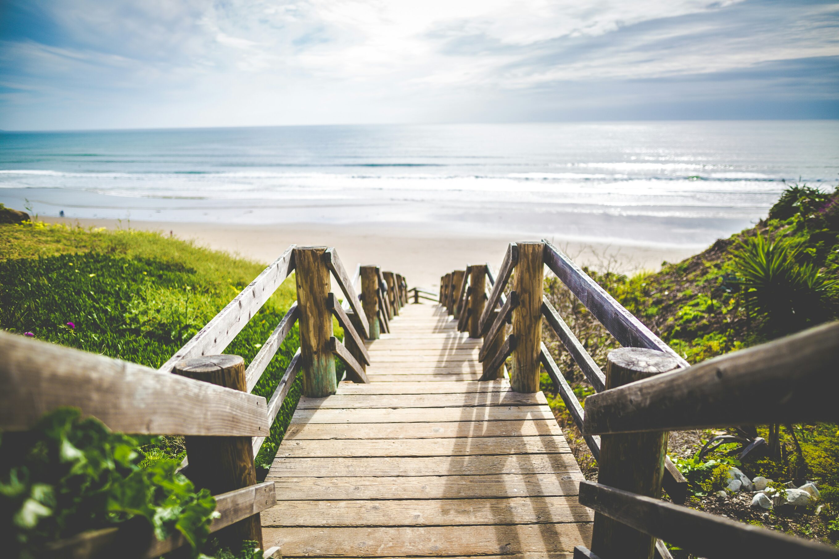a stairway leading down to the beach