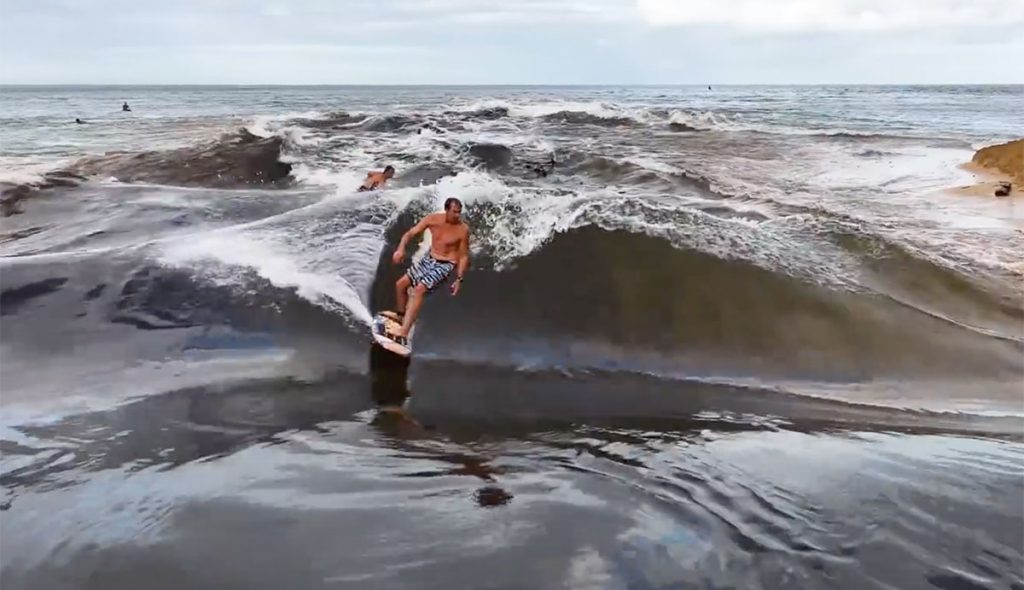 Jamie O'Brien surfing Waimea River wave