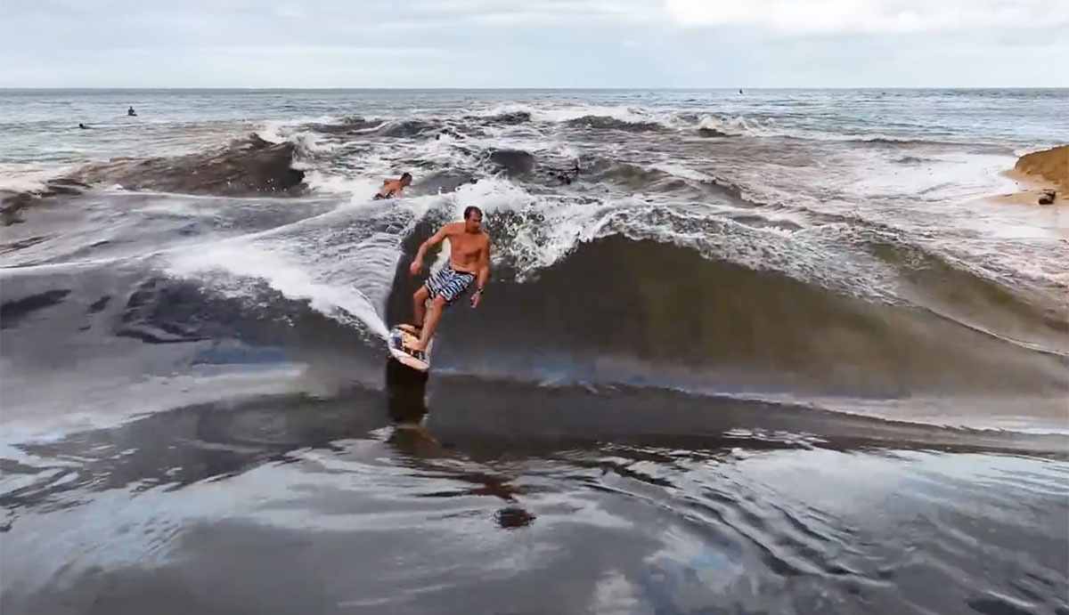 Jamie O'Brien surfing Waimea River wave