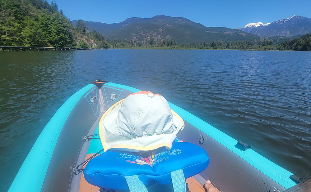 a child in the front seat of the bote aero lono kayak