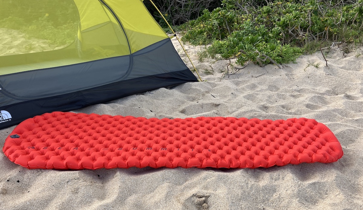 sea to summit ether sleeping pad in front of a tent on the beach