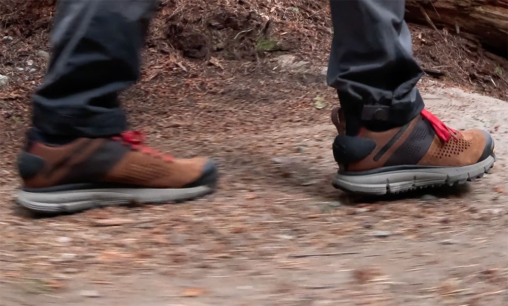 a view of the Danner Trail 2650 hiking shoes from the side, while on the trail