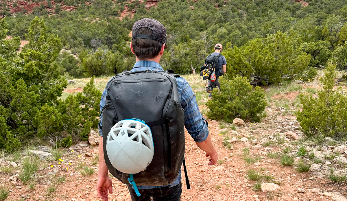 hiking to the crag with a travel backpack