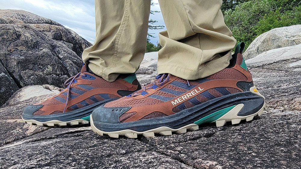 a view of the Merrell Moab Speed 2 hiking shoes standing on a rock