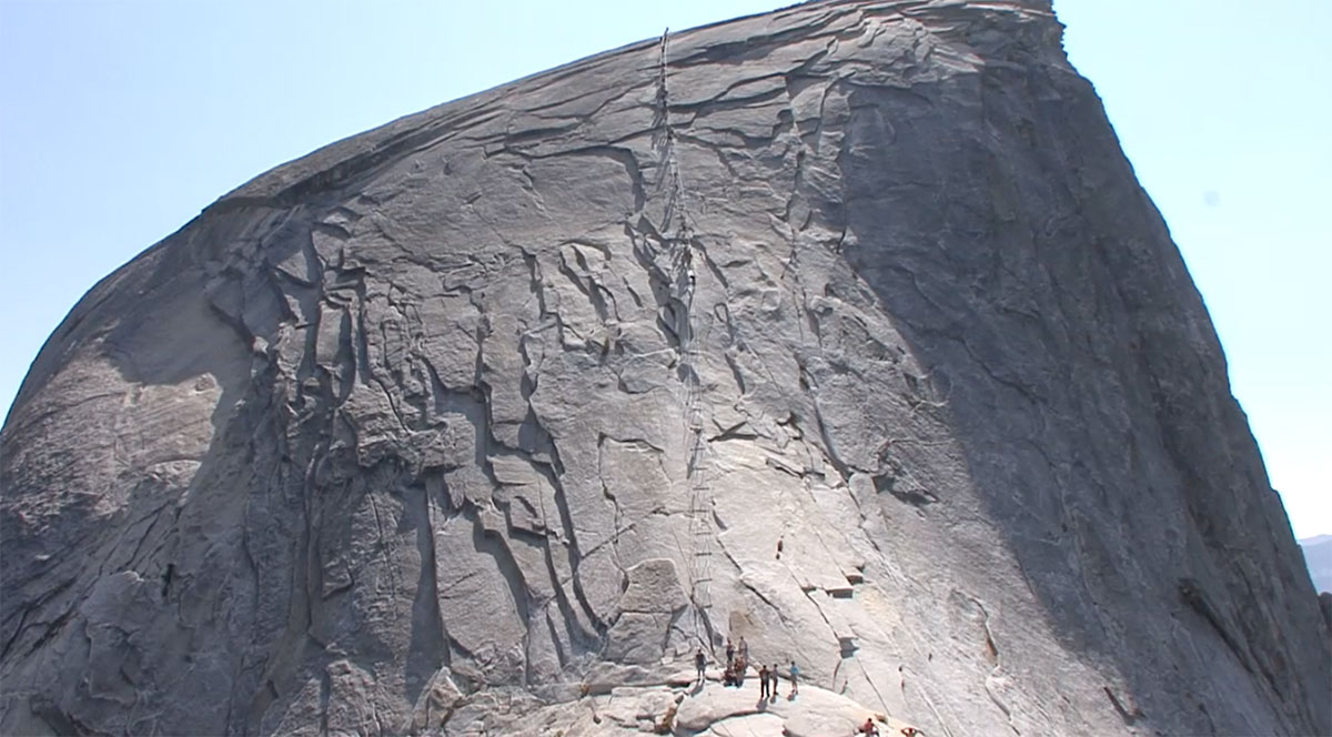 hiker on Half Dome