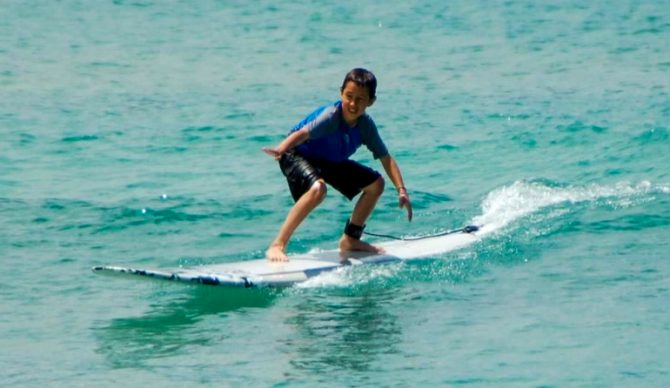 Will Sileo at age 7 surfing