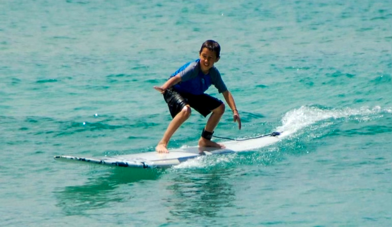 Will Sileo at age 7 surfing