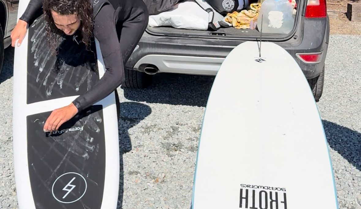 waxing a foam surfboard