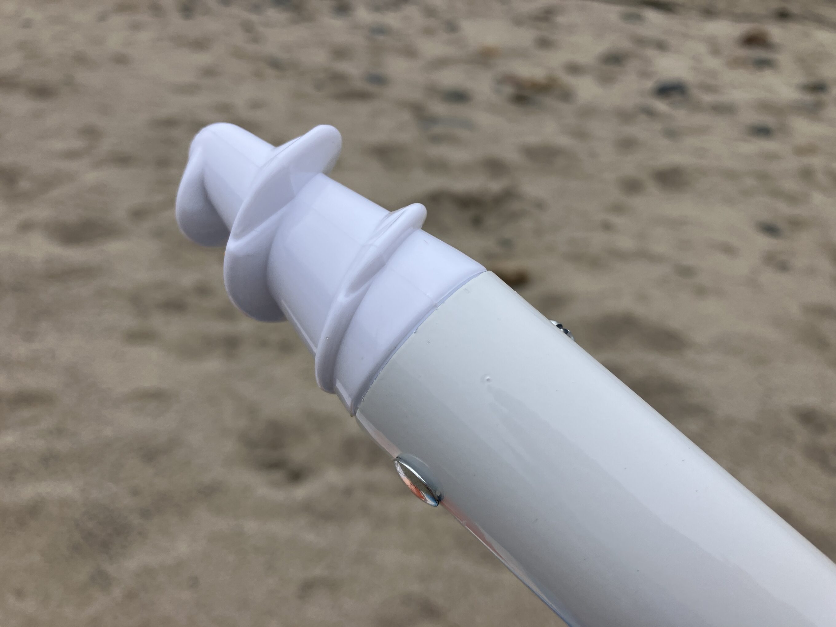 the base of a beach umbrellas