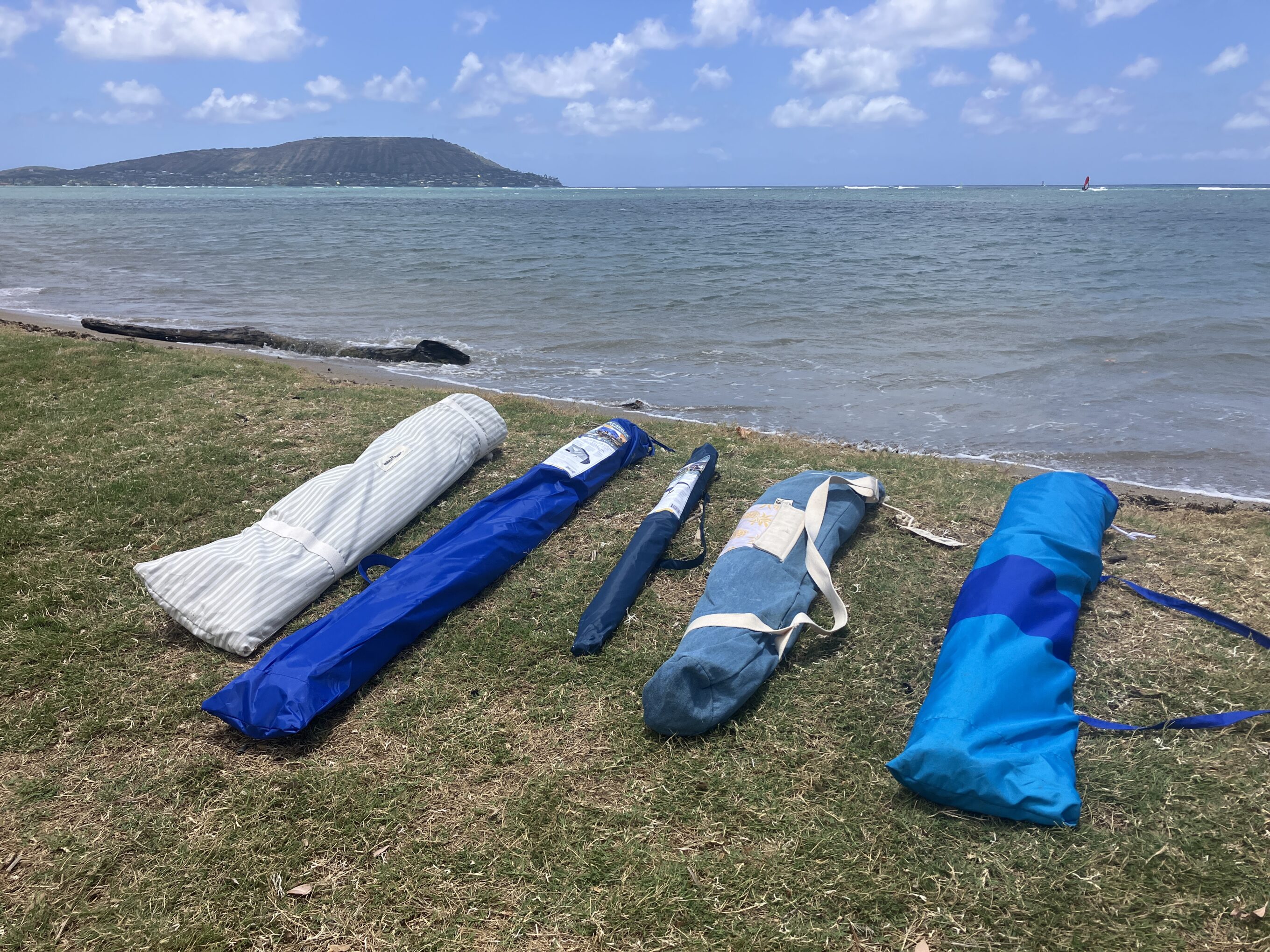 beach umbrellas in their bags